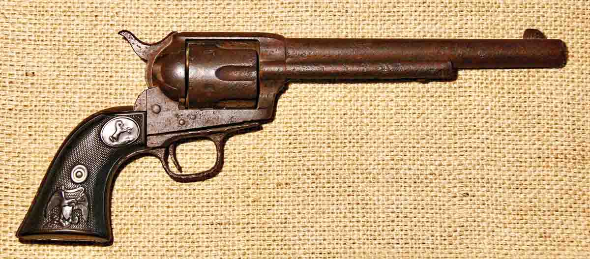 The Colt .45 caliber “Peacemaker” found in the desert in southeast Arizona. It had been fired twice when the gun was dropped, likely during a gunfight, given the lawless location between Tombstone, Arizona, and the Mexican border. There is an empty chamber, followed by two  fired chambers, and three fully loaded ones.